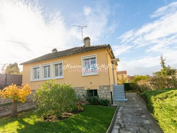 Maison de 63 m² avec sous-sol total, double séjour et grand jardin - à rafraîchir