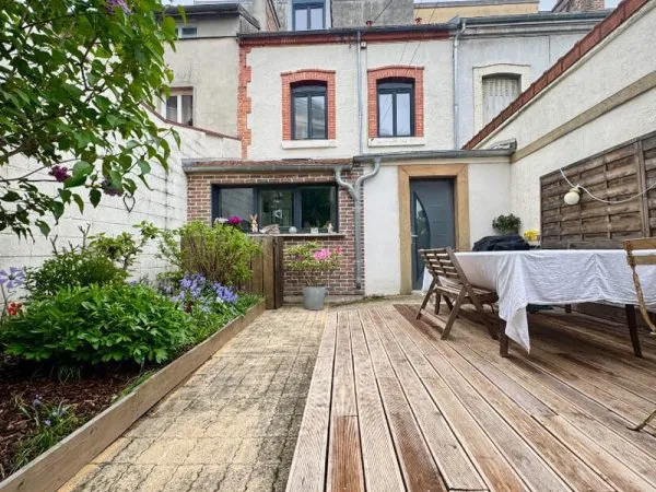 Maison proche de l'hyper centre avec extérieur