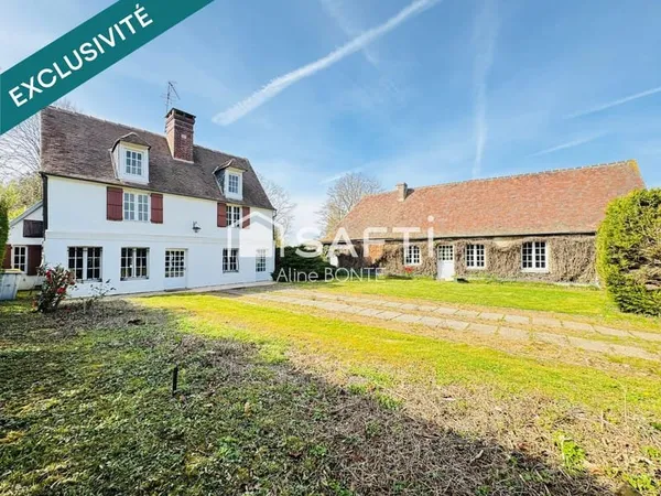 Propriété de deux habitations avec un garage