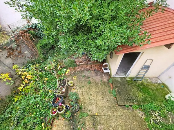 Appartement 3 pièces dans maison avec jardin