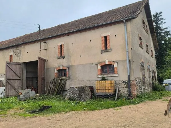 Bâtiment plus terrains Cusset 03