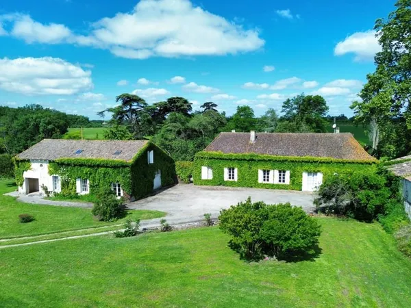 Propriété avec deux maisons, 3 ha et dépendances au calme
