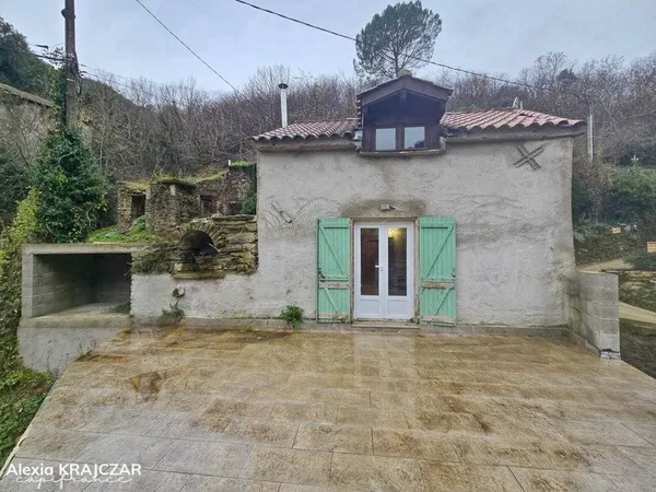 A VENDRE Maison de campagne - 2 chambres - Terrasse et jardin - 54,95m² habitables + cave - Place de