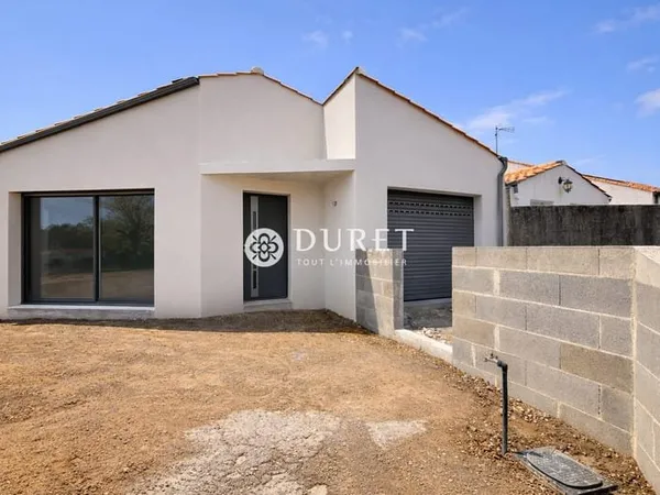 Maison neuve plain-pied avec patio et jardin - RE2020