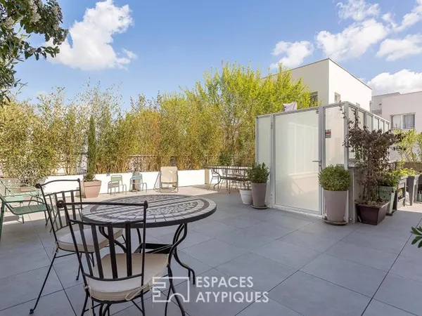 Appartement esprit maison sur le toit avec terrasse