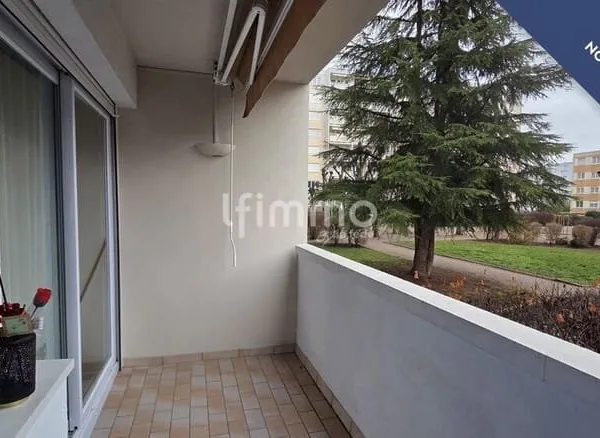 T3 traversant, balcon, parking et cave