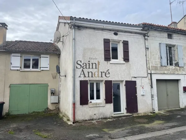 Maison de ville avec jardin et dépendances