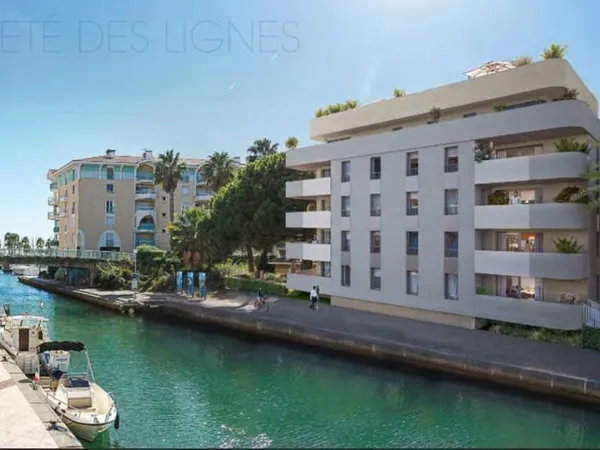 FRAIS REDUITS !!! APPARTEMENT 2 PIECES DE 47 M², UNE CHAMBRE, TERRASSE DE 11 M² ET UN STATIONNEMENT