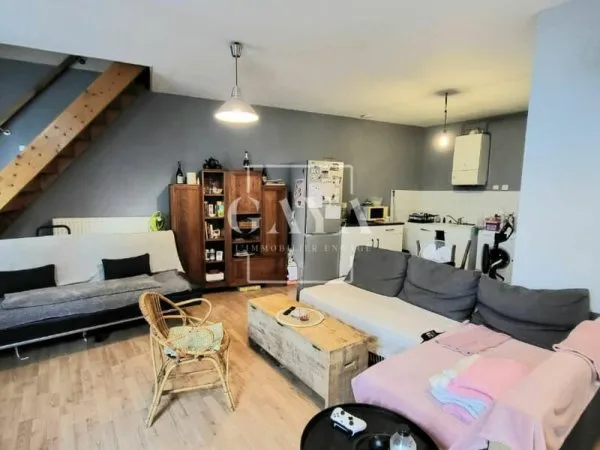 Maison à usage mixte commerce et habitation - Louée au total 1691 euros/mois