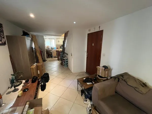 T3 duplex dans immeuble en pierres 38460 CREMIEU