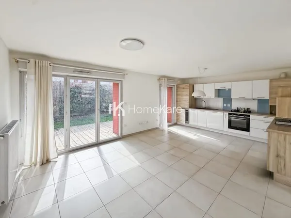 Superbe Appartement avec Grand Jardin en Ville