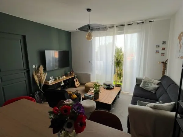 Appartement T2 avec balcon, 1 garage + 1 place de parking