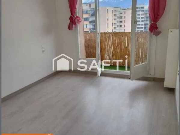 Appartement T3 avec balcon, cave et place de parking