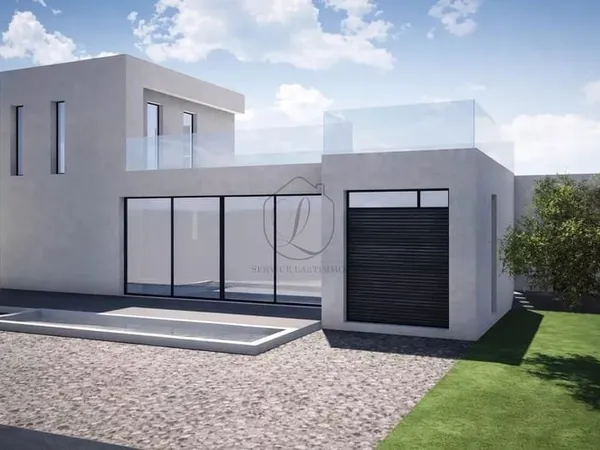 À la vente - Terrain de 587m² avec permis de construire