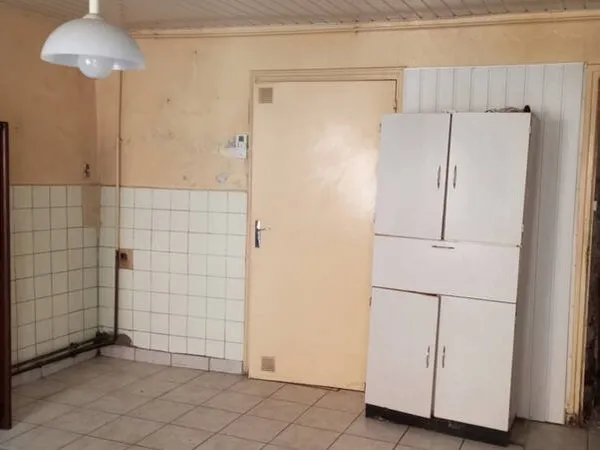 Maison de ville proche des commodités.