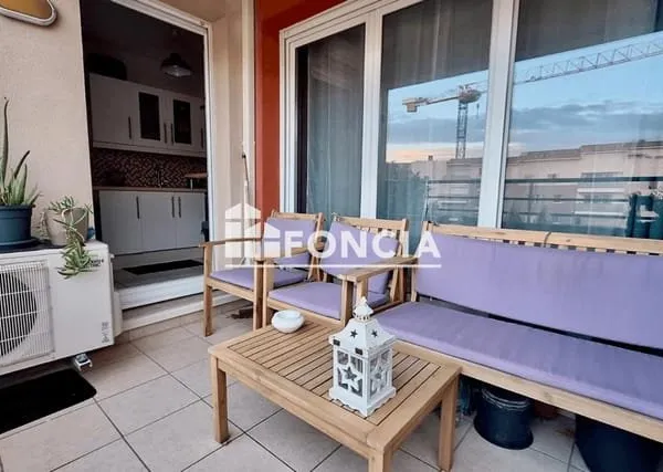 Appartement 3 pièces entièrement rénové - Box et balcon