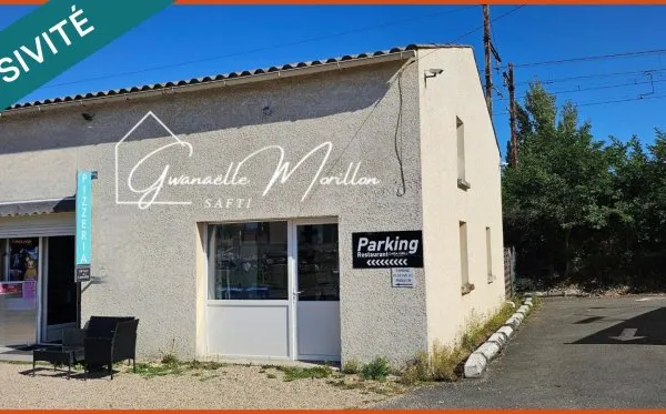 2 locaux commerciaux et 1 habitation.