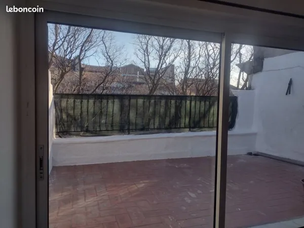 Appartement avec grande terrasse en plein coeur de la ville