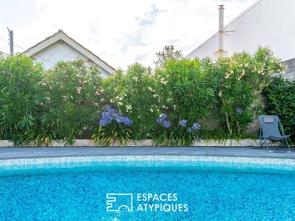 Villa confidentielle avec piscine rooftop et deux garages au coeur d'un quartier prisé