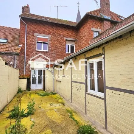 Maison de 7 pièces avec 5 chambres, cour , garage avec atelier, jardin proche commodités + projet d'
