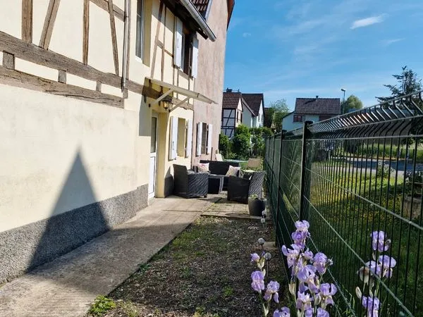 Part loue appartement dans maison