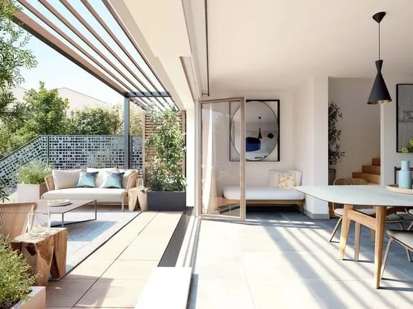Au coeur du village, proche de la plage - résidence de 7 maisons triplex