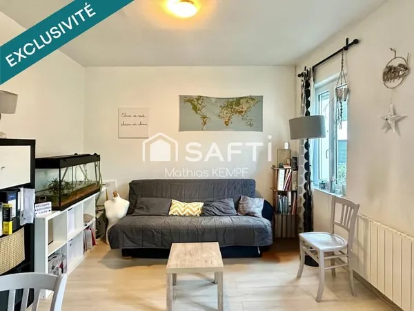 APPARTEMENT COSY 38m² - COUR COMMUNE - CAVE