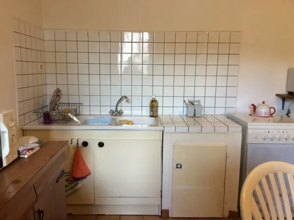 LOGEMENT TYPE F1 avec 1 CHAMBRE