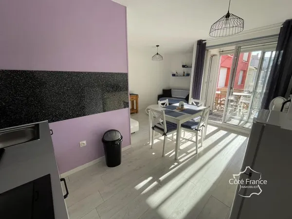 Appartement centre port doté d'une chambre, 2 terrasses, cellier et garage possible