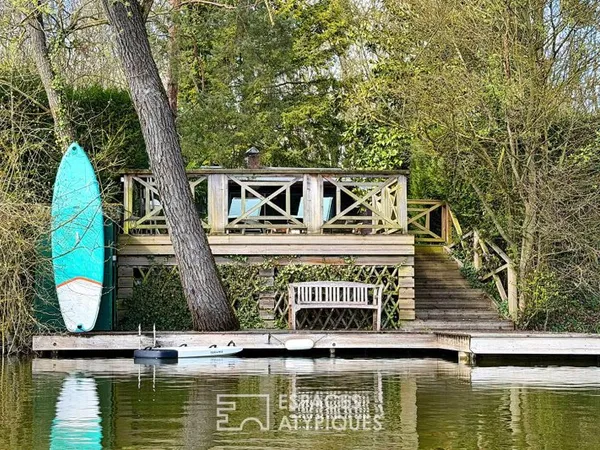 Chalet en bois rénové avec terrasse, jacuzzi et vue lac