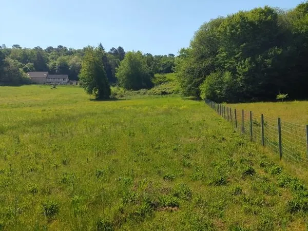 Terrain constructible avec cu pour 3 maisons