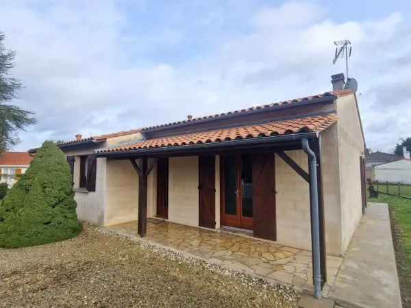 Plain-pied fonctionnel avec garage aménageable et terrain de 750 m²