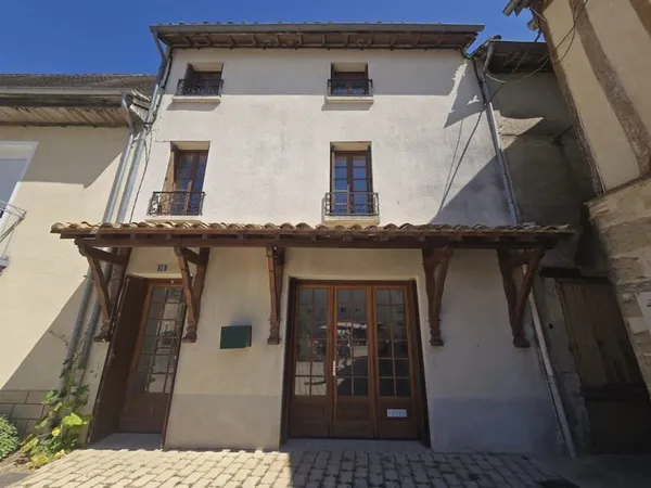 Maison en plein coeur du village