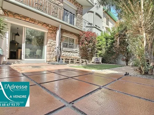 A VENDRE APPARTEMENT REZ-DE-CHAUSSEE DE 70.60 M² AVEC JARDIN, TERRASSE ET PARKING SECURISE
