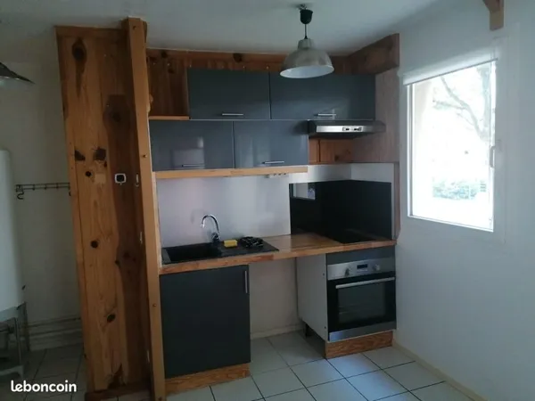 Appartement F2 bis - 56 m² - Parking - à deux pas du TEOR T4 et du métro Rive Gauche