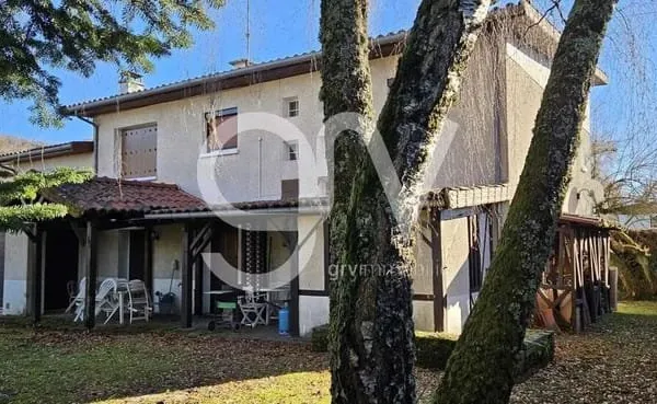 Maison dans quartier calme avec jardin et possibilité de logement/bureau indépendant