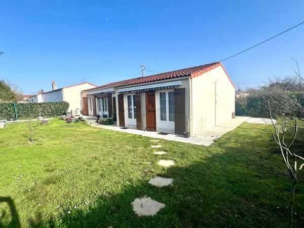 Maison individuelle - 4 chambres - garage - jardin