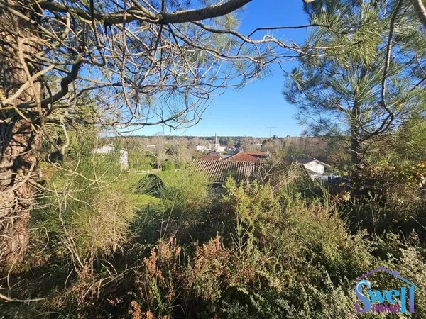 Terrain à bâtir de 2951m² avec vue panoramique sur le village