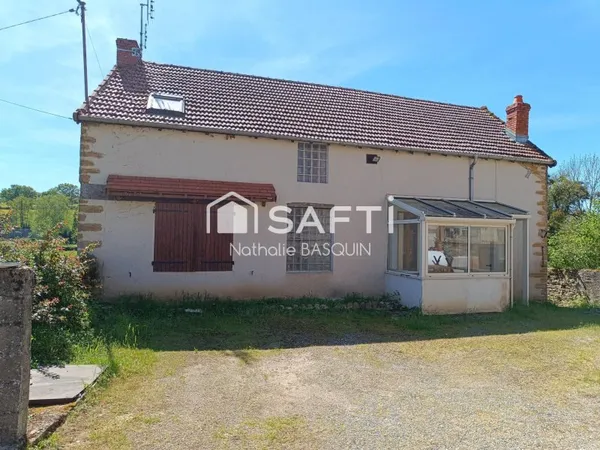 Genouilly Grande maison en pierre avec jardin