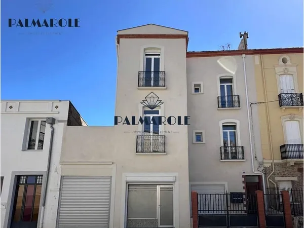 Immeuble 3 appartements, 1 local, 2 garages