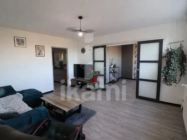 Appartement T4 rénové avec balcon, garage et cave proche gar