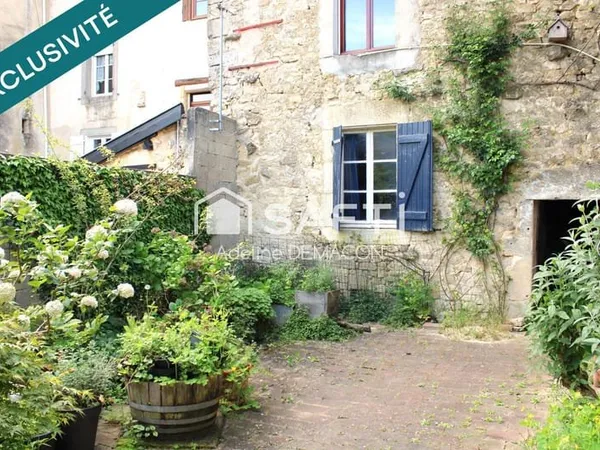 Maison avec jardin et grange