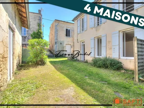 Ensemble immobilier composé de quatre maisons