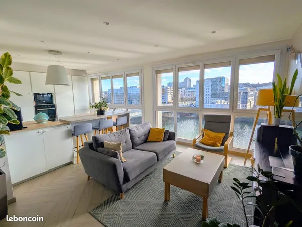 Vue Seine - Appartement traversant 63 m² - 6e étage avec ascenseur