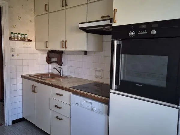 Appartement T3 avec balcon, cave et garage