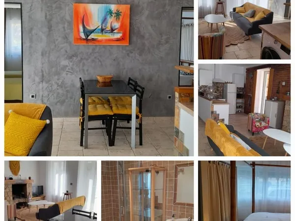APPARTEMENT REZ DE JARDIN dans village