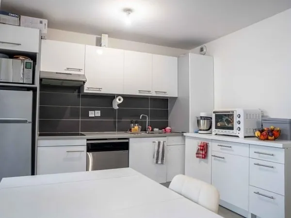 Appartement T3 de 60 m² avec balcon, ascenseur et parkings - Tournefeuille Centre-Ville
