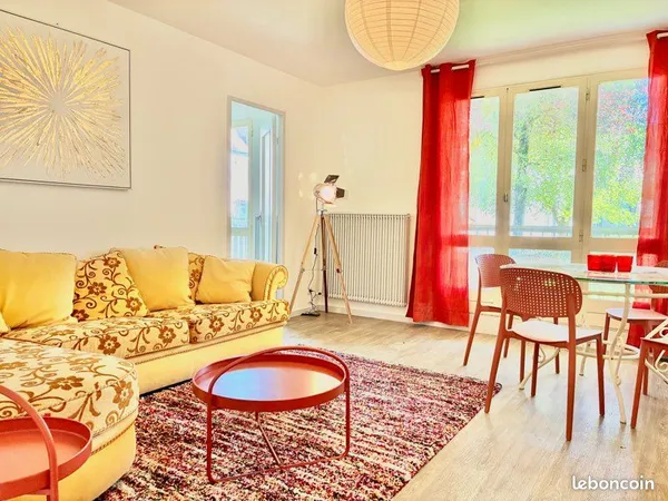 F3 au centre ville avec grand balcon en rez-de-jardin