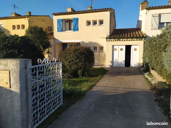MAISON DE VILLE AVEC JARDIN actuellement louée
