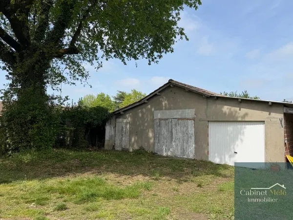 Terrain constructible de 1000m2 avec dépendance de 80m2